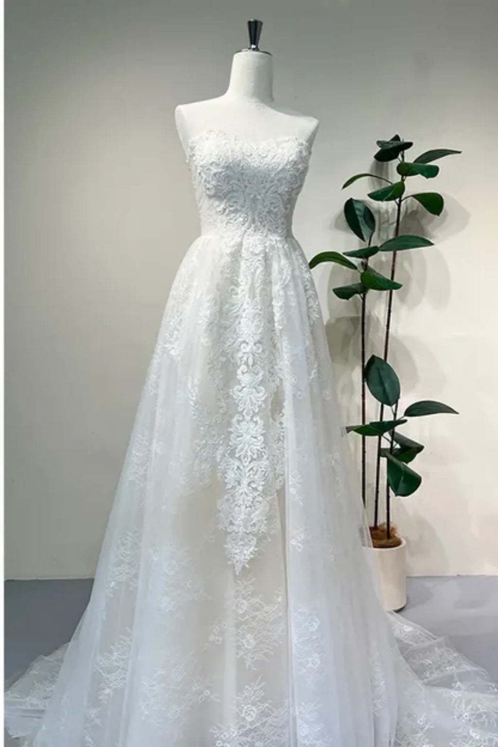 Strapless lace A-line wedding dress without overlay, sweetheart neckline convertible bridal gown front view