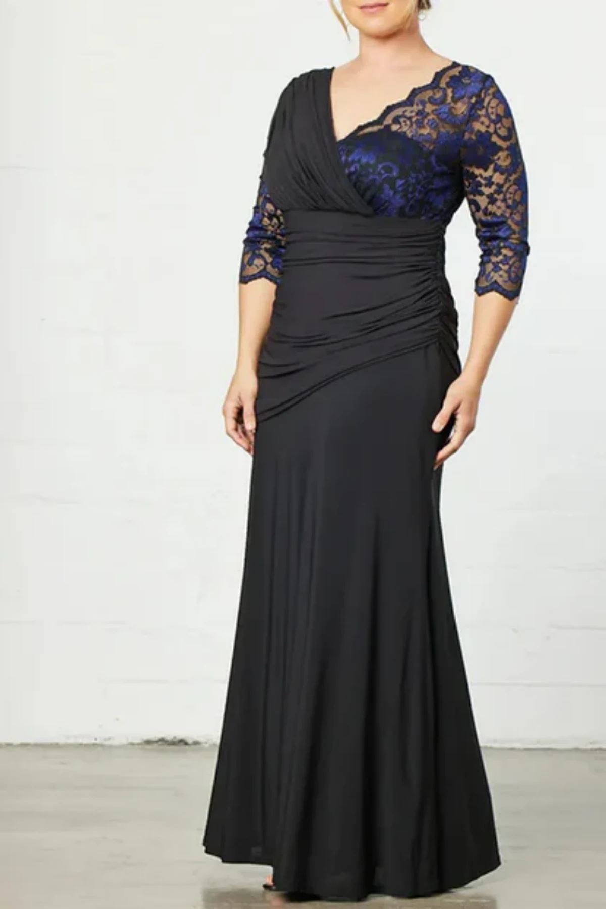 Black mother of the bride dress with lace bodice, ruched waist, and long chiffon skirt, elegant formal evening dress