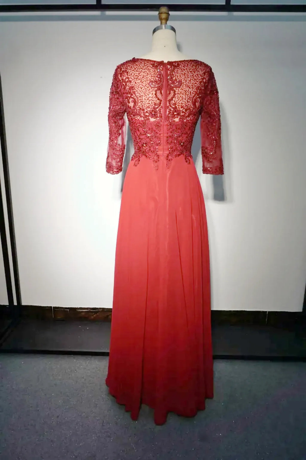 Red mother of the bride dress with lace illusion back, sheer 3/4 sleeves, and flowing chiffon skirt, elegant floor-length wedding gown