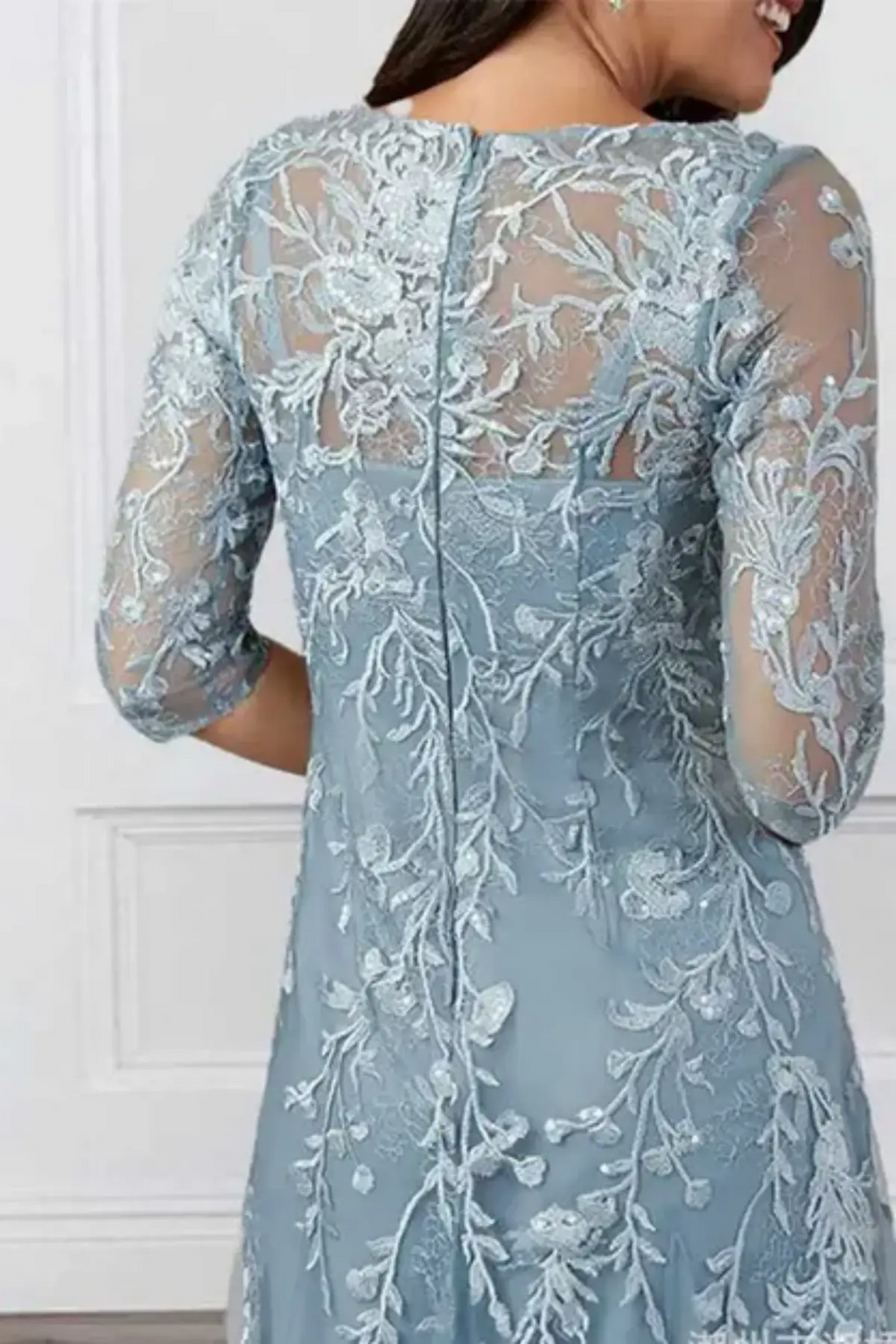 Elegant tea-length mother of the bride dress in dusty blue with sheer 3/4 sleeves