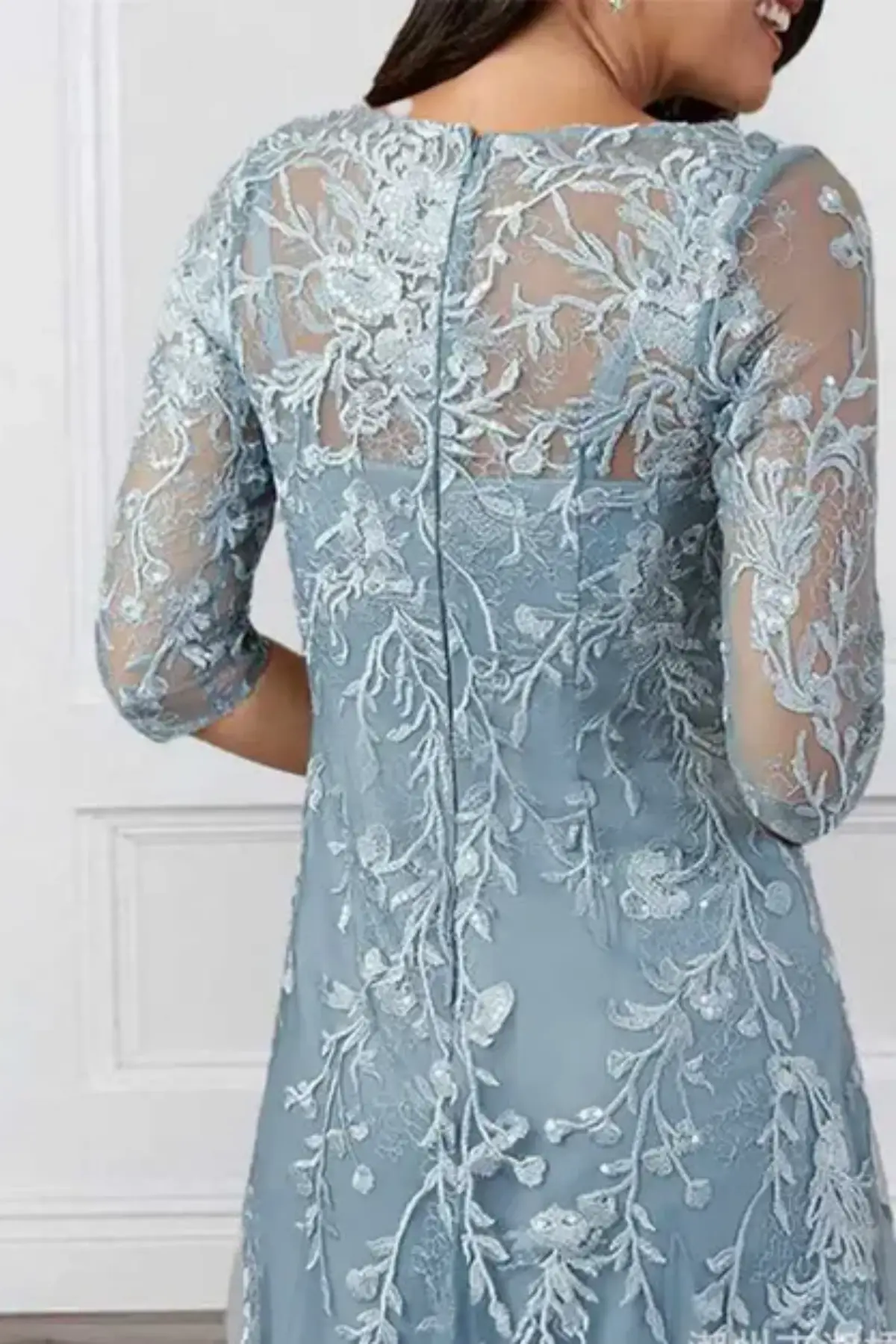 Elegant tea-length mother of the bride dress in dusty blue with sheer 3/4 sleeves