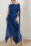 Full-length front view of a navy blue chiffon mother of the groom dress on a mannequin, showcasing a jewel neckline, ruched bodice, and an asymmetric high-low hemline