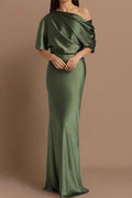 Close-up of the bodice on an olive green formal evening gown, showcasing the elegant cross-body fabric draping and single shoulder strap detail