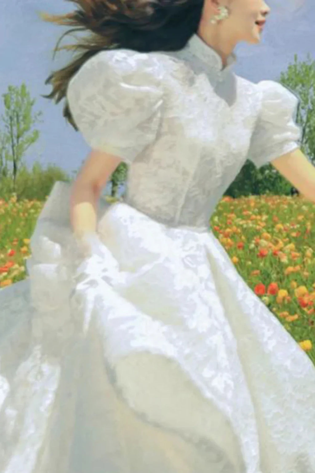 Fairytale lace wedding dress with puff sleeves and flowing tea-length skirt in motion outdoors
