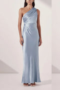 Front full-length view of an ice blue satin one-shoulder bridesmaid dress with diagonal ruched bodice and column silhouette.
