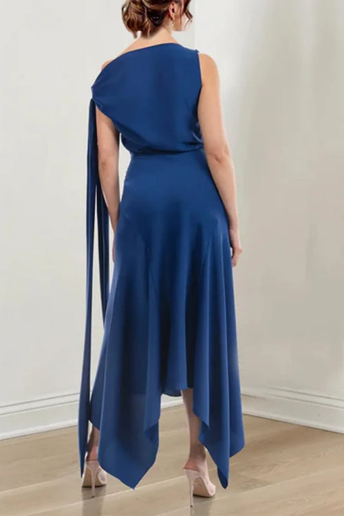 Full back view of a floor-length navy chiffon evening gown on a mannequin, featuring a clean jewel neck design and a flowing draped skirt