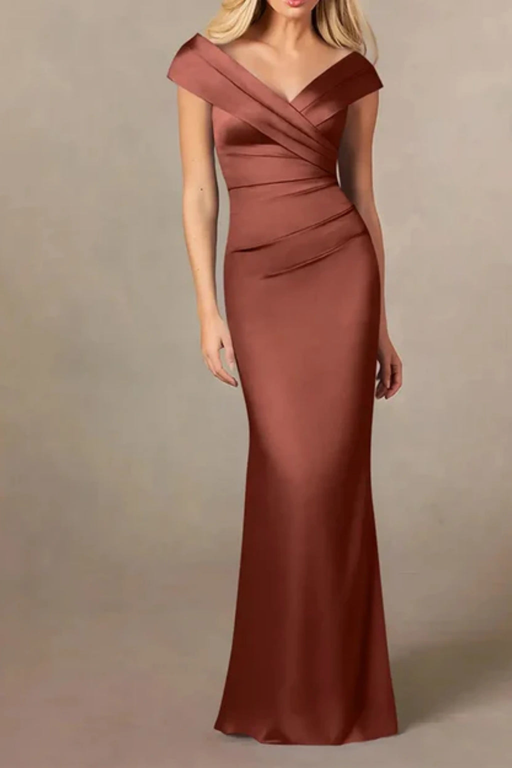 Full-length front view of an auburn satin mother of the bride dress on a mannequin, showcasing a pleated off-the-shoulder portrait neckline and a tailored mermaid silhouette