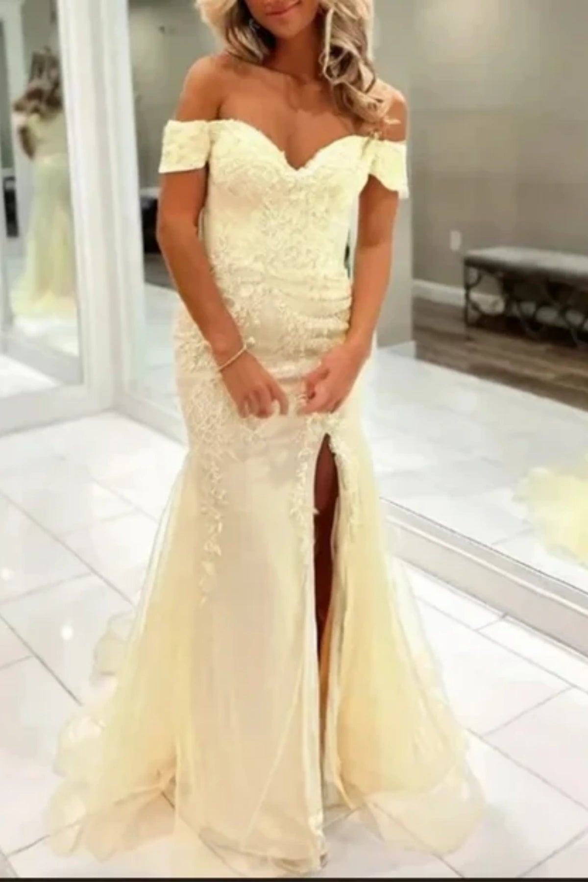 yellow prom dress with off the shoulder neckline in mermaid silhouette