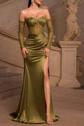 Front full-length view of an olive green off-the-shoulder sheer lace corset prom dress with long sleeves and a high-slit satin skirt.
