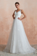 Side view of V-neck lace A-line wedding dress with lightweight tulle skirt